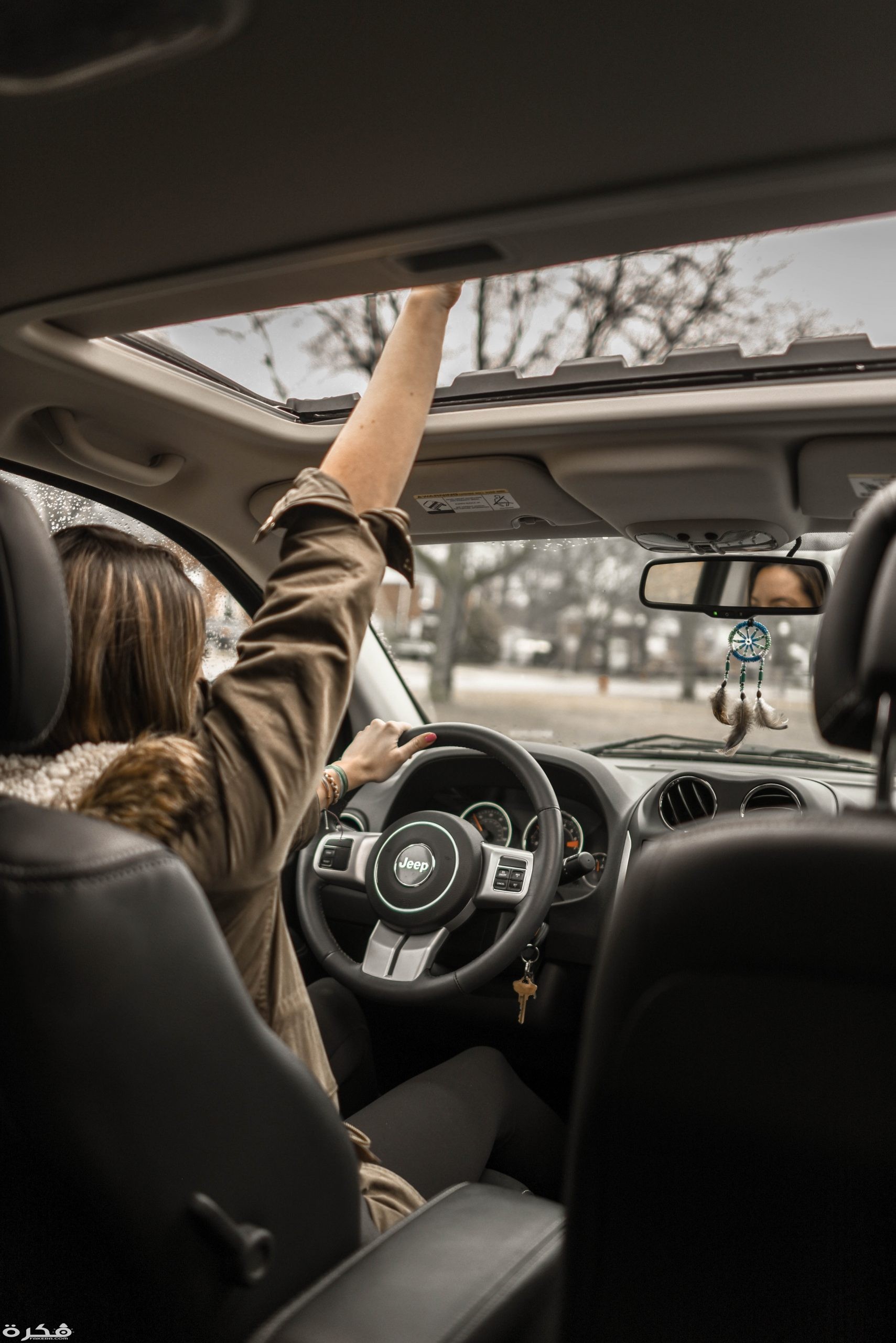 photo of woman driving car 1051071 scaled