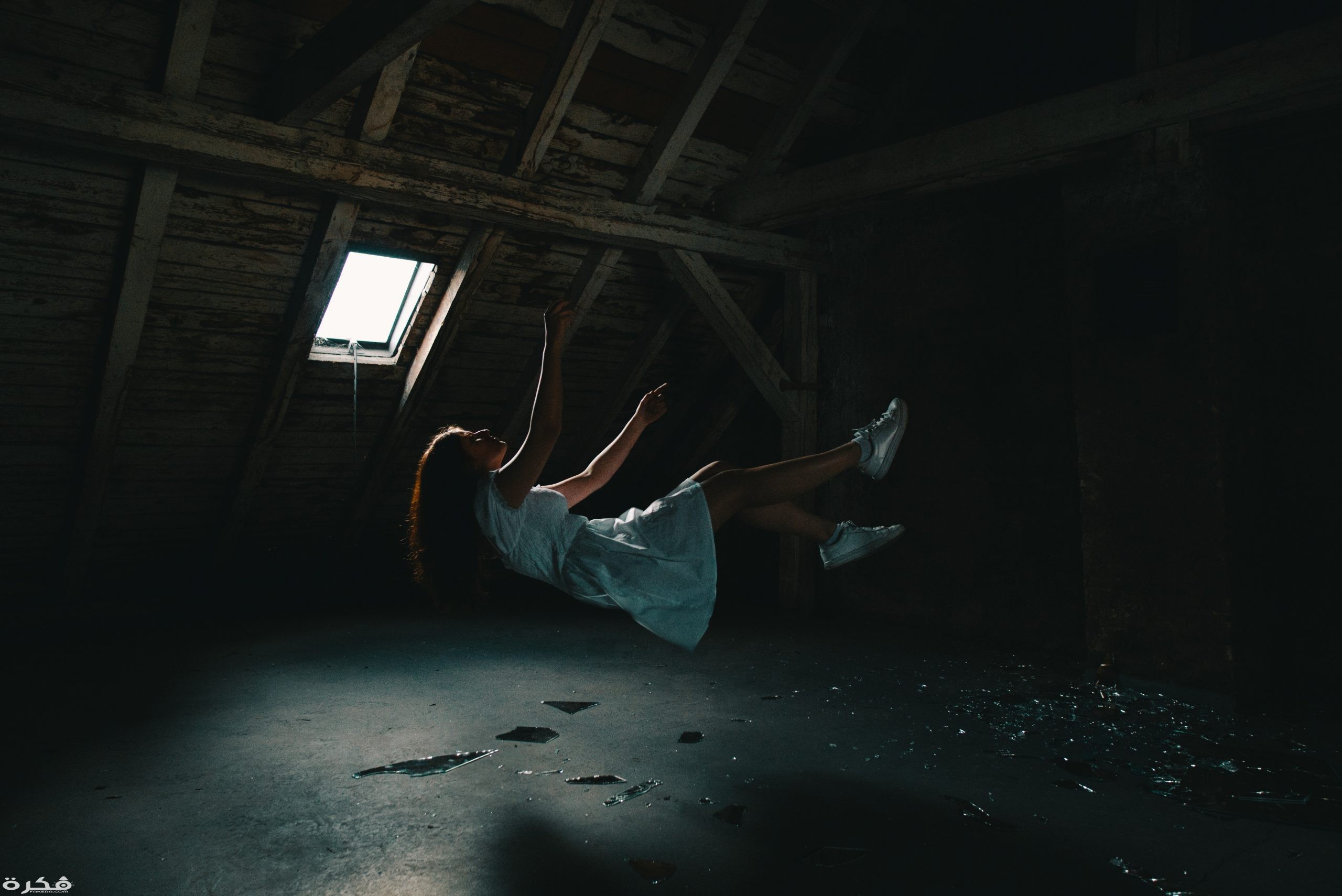 woman in white dress falling on gray concrete floor 3856635 scaled