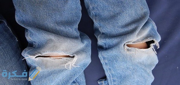 رؤية الميت بثوب ممزق